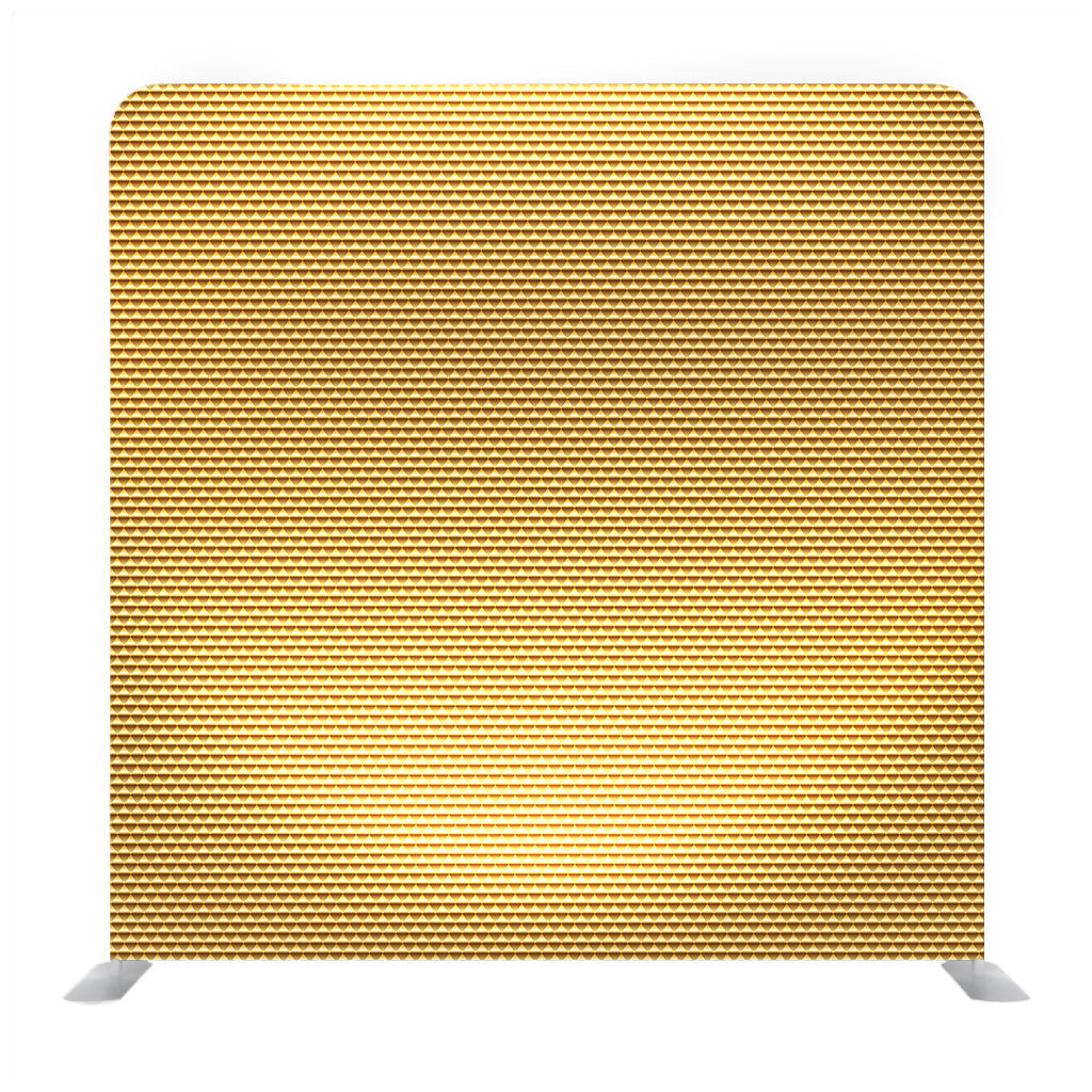 A close-up of golden fabric background texture backdrop